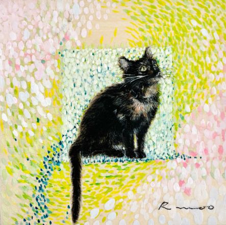 春を見上げる子猫